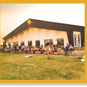 The outdoor patio at Omni Winery in Rosemount, MN. Cornhole boards and plenty of seating.