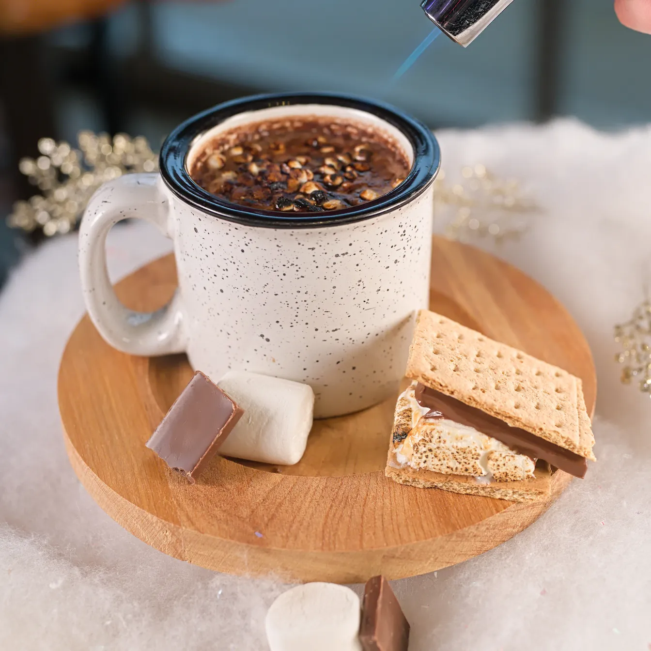 Toasted marshmallow syrup, milk chocolate, chai, and milk, topped with toasted mini marshmallows.