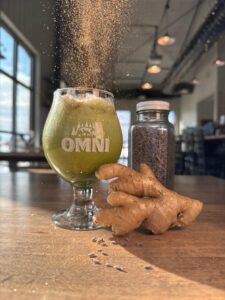 Fairy Good Matcha with ginger root and cinnamon sprinkling over it